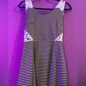 Poof Couture striped gray/white dress, lace detailing. Fitted top; flowing skirt